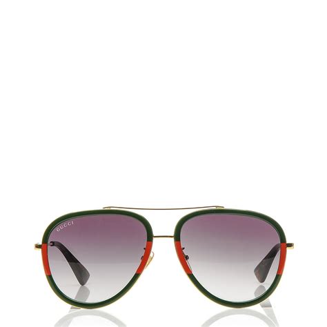 gucci sunglasses with red and green on sides|Gucci aviator style sunglasses.